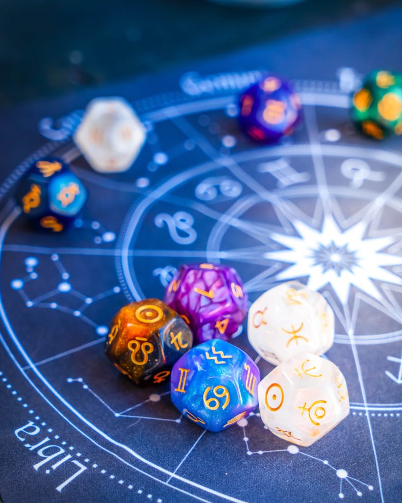 Horoscope zodiac circle with divination dice. Fortune telling and astrology predictions concept, magic rituals and exoteric experience